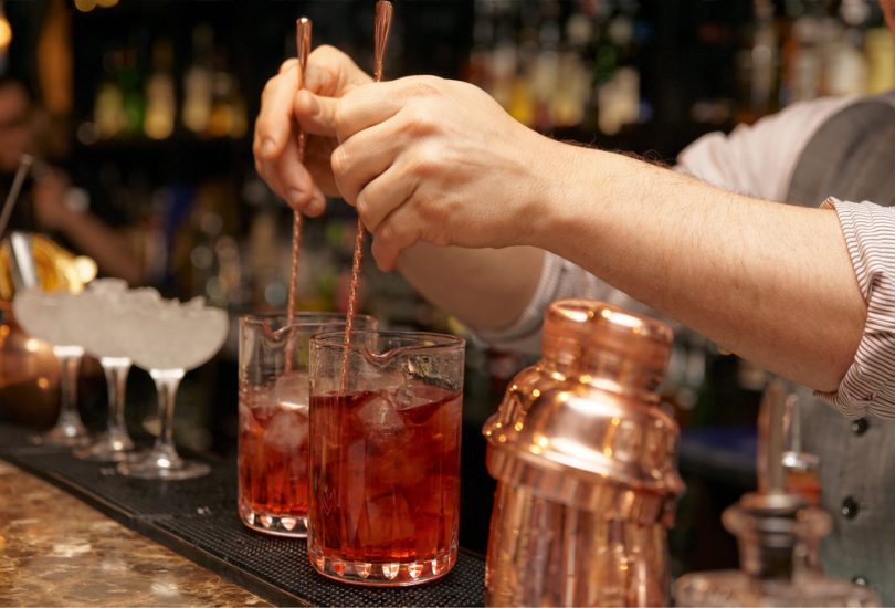 Bartender is creating homemade cocktails - important event food trend